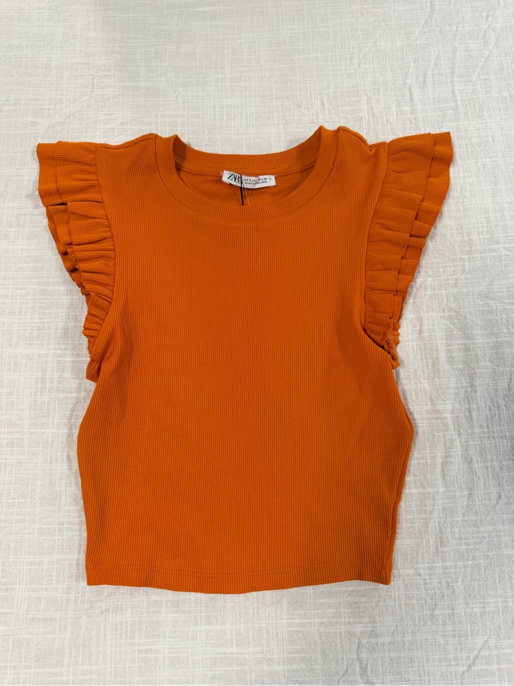 Zara women’s size small Orange Ruffle Sleeve Ribbed Tank Top. New without tags